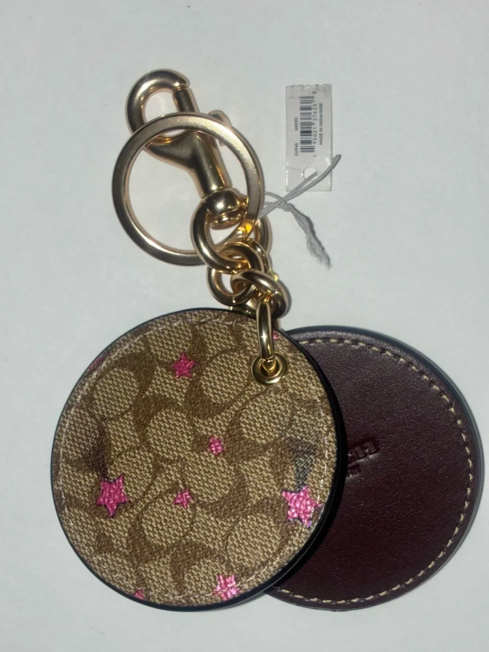 Coach Signature Mirror Bag Charm Keychain With Pink Disco Star Print C6945 NWT